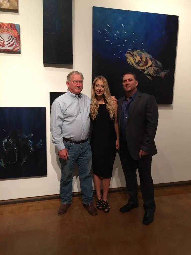 Brittney Drinkard won a $50,000 scholarship for her 7-pound, 4-ounce sheepshead in the CCA STAR tournament when she was 8 years old. Last December, she graduated from Lamar University with an art degree. At her thesis showing, she stood with her father, David Jr, and grandfather, noted wildlife artist David Drinkard. The showing focused on paintings of saltwater species. Photos from Brittney Drinkard.